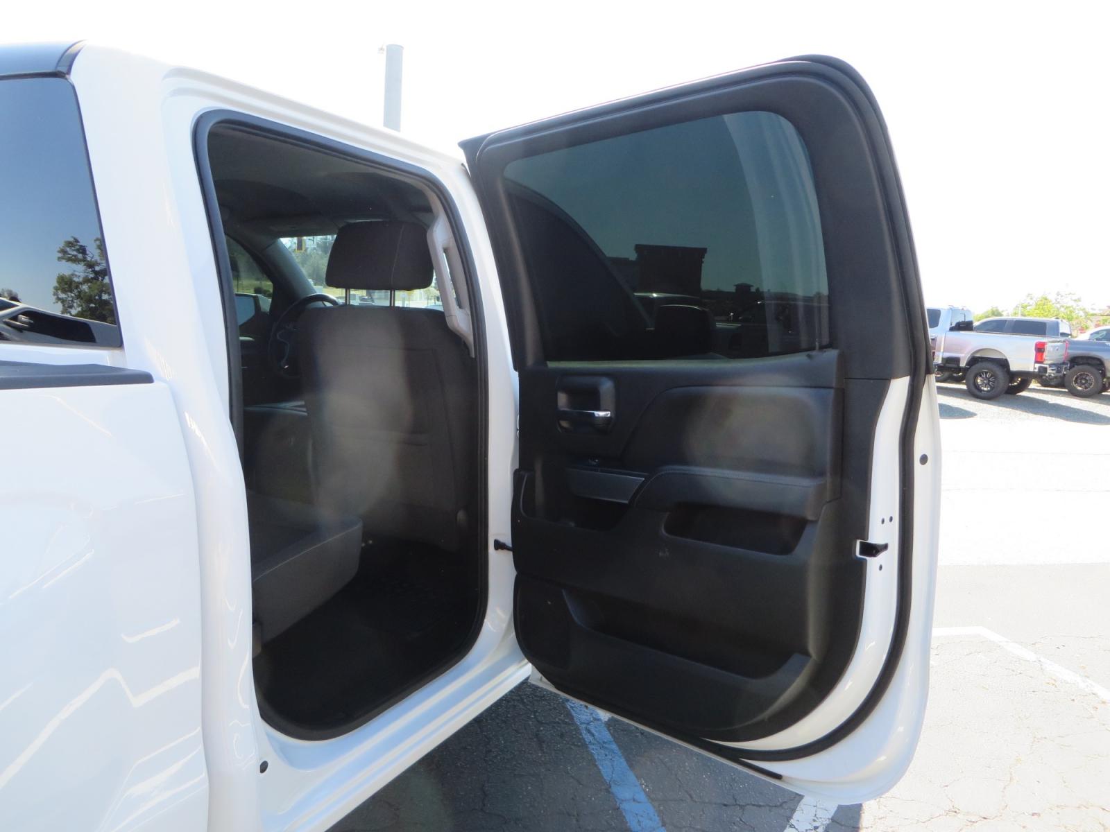 2018 White /BLACK Chevrolet Silverado 1500 LT (3GCPCREC7JG) with an 5.3L V8 OHV 16V engine, automatic transmission, located at 2630 Grass Valley Highway, Auburn, CA, 95603, (530) 508-5100, 38.937893, -121.095482 - Must see Pre Runner.... CST front lift spindals, Camburg UCA's, King Adjustable 2.5 Coil-overs, King 2.5 rear shocks, 35" Toyo RT Trail tires, 17" Method Race wheels, MZ front skid plate, G2 rear differntail cover, Full size bed mounted spare tire, Black Vinyl roof wrap, smoke tail lights and 3rd br - Photo #52